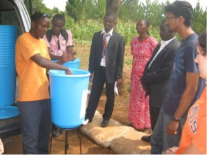 Tiva water representative introducing the Tiva water filters to the Teachers and LINC Team